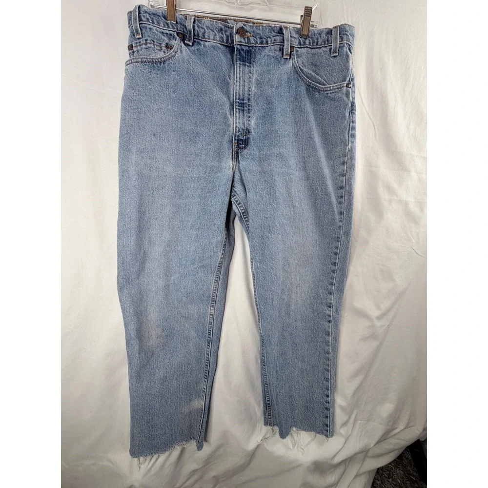 Levi's 550 Relaxed Fit Jeans W38 Light Wash Made in USA Cut Off Hem Distressed